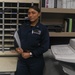 Personnel Specialist 2nd Class Noryko Borja, from Elizabeth, New Jersey, poses for a picture in the administration's office aboard the USS Rafael Peralta (DDG 115) in the South China Sea