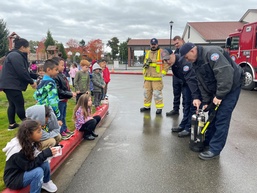JBLM firefighters introduce fire safety to local students