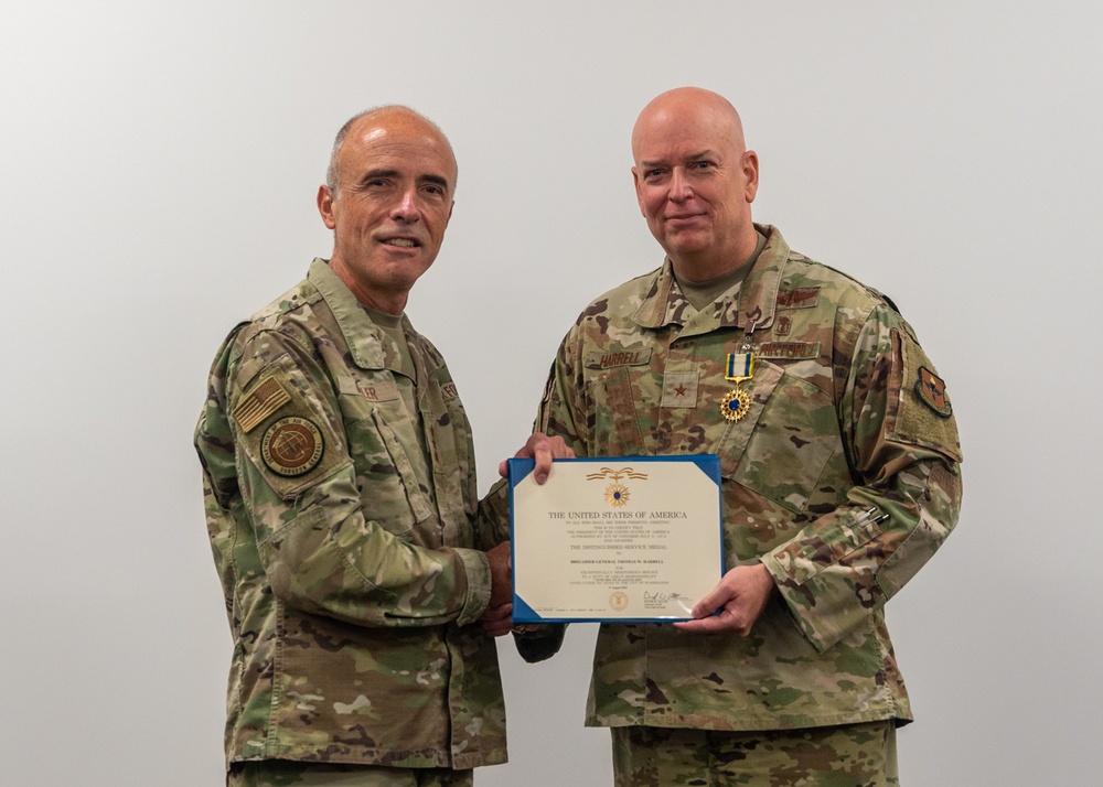 Air Force Surgeon General presents Distinguished Service Medal to 59th Medical Wing commander