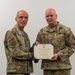 Air Force Surgeon General presents Distinguished Service Medal to 59th Medical Wing commander