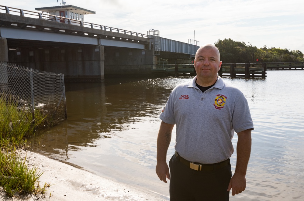 To Build a Bridge, Extend Your Hand: Base firefighter uses ingenuity to manually turn stuck swing-bridge, freeing patrons trapped at Onslow Beach