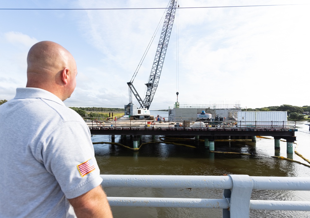 To Build a Bridge, Extend Your Hand: Base firefighter uses ingenuity to manually turn stuck swing-bridge, freeing patrons trapped at Onslow Beach