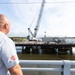 To Build a Bridge, Extend Your Hand: Base firefighter uses ingenuity to manually turn stuck swing-bridge, freeing patrons trapped at Onslow Beach