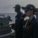 Sailors perform digital fluxgate magnetic compass (DFGMC) calibrations on the bridge aboard the USS Rafael Peralta (DDG 115) in the South China Sea