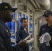 Sailors conduct engineering team drills aboard the USS Rafael Peralta (DDG 115) in the South China Sea