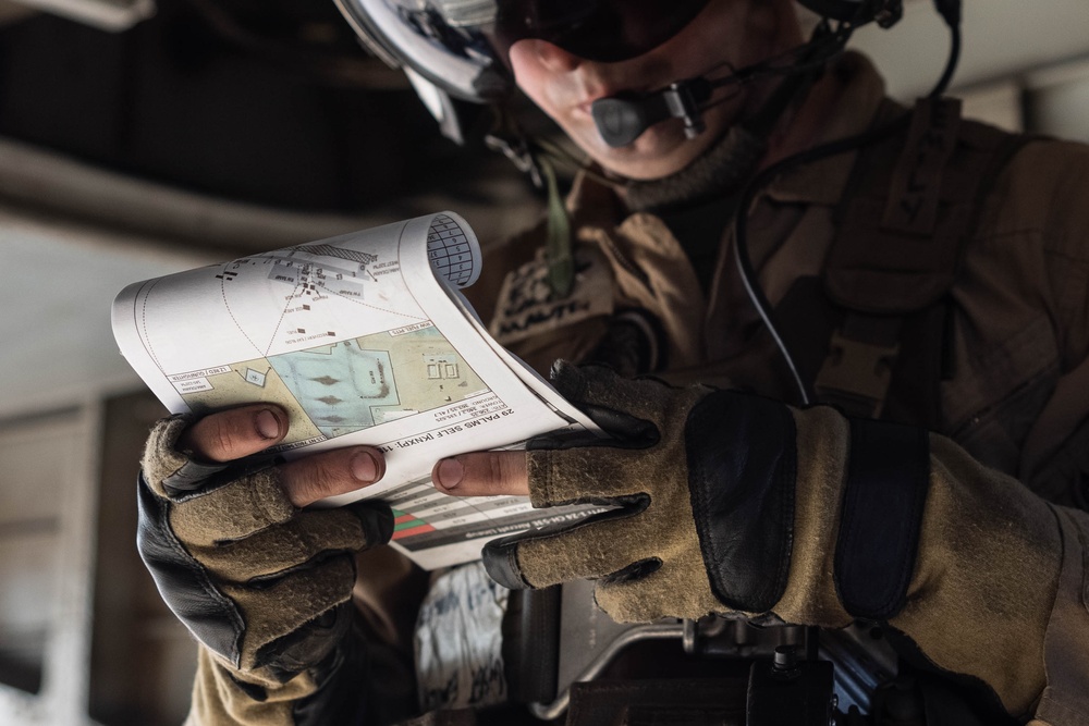 U.S. Marine Corps CH-53 helicopters execute battle drills and external lifts