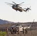 U.S. Marine Corps CH-53 helicopters execute battle drills and external lifts