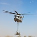 U.S. Marine Corps CH-53 helicopters execute battle drills and external lifts