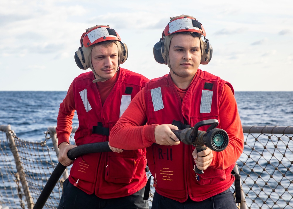 Sailors aboard USS John Finn (DDG 113) Conduct Crash and Salvage Drill