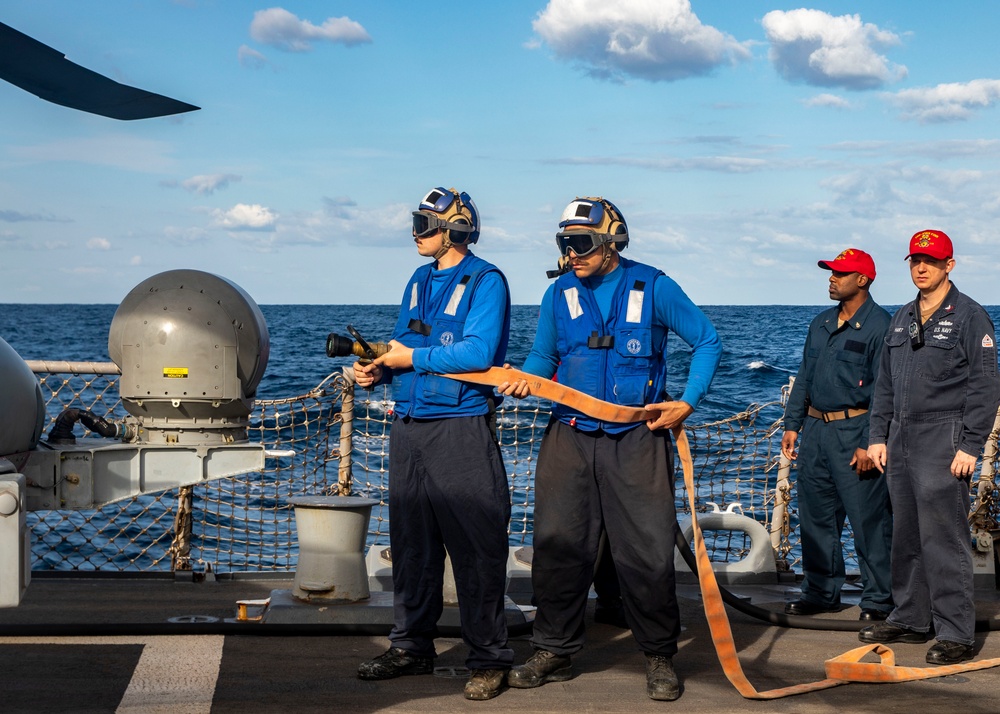 Sailors aboard USS John Finn (DDG 113) Conduct Crash and Salvage Drill