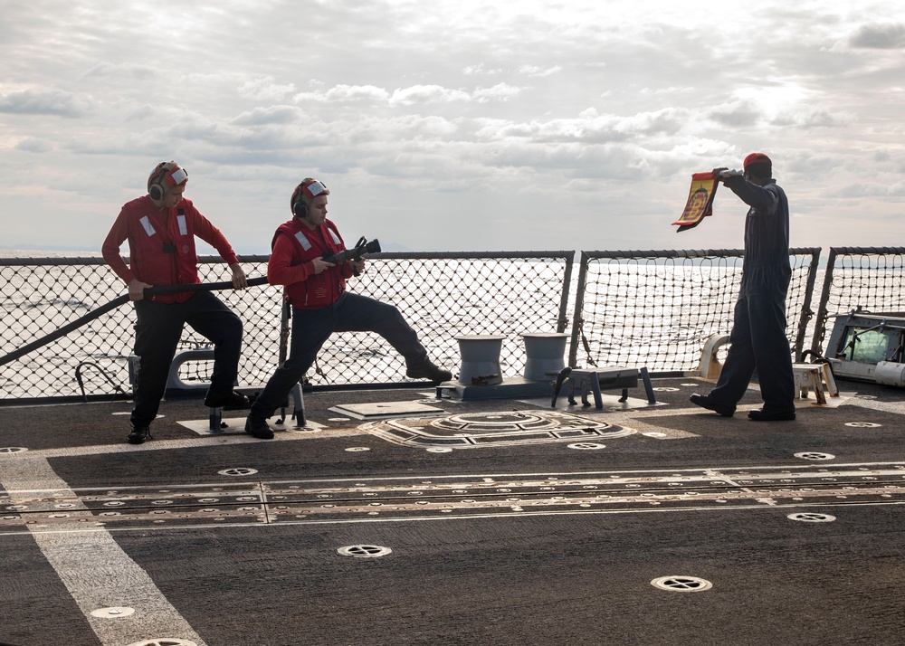 Sailors aboard USS John Finn (DDG 113) Conduct Crash and Salvage Drill