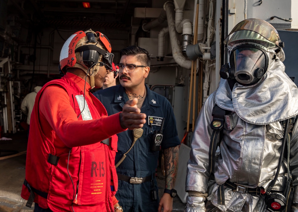 Sailors aboard USS John Finn (DDG 113) Conduct Crash and Salvage Drill