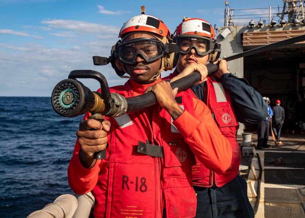 Sailors aboard USS John Finn (DDG 113) Conduct Crash and Salvage Drill