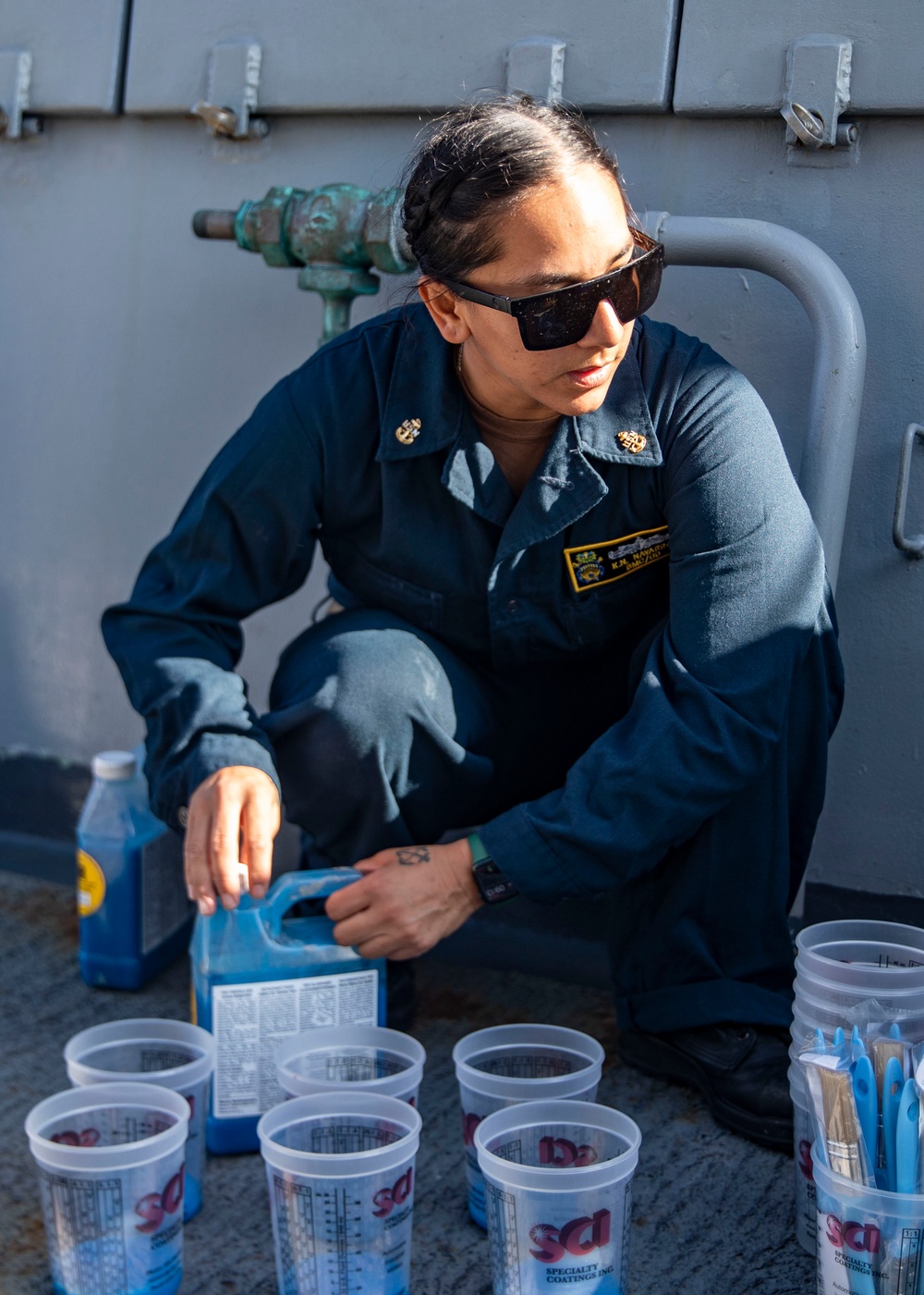 Sailors Conduct a Fresh-Water Wash Down Aboard USS John Finn (DDG 113)