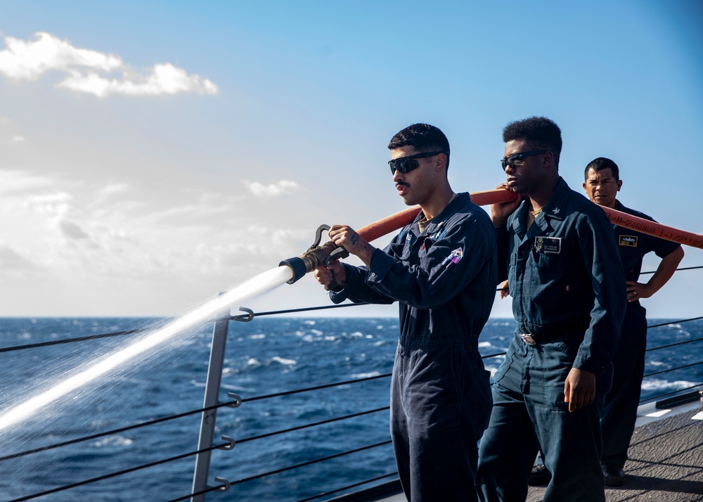 Sailors Conduct a Fresh-Water Wash Down Aboard USS John Finn (DDG 113)