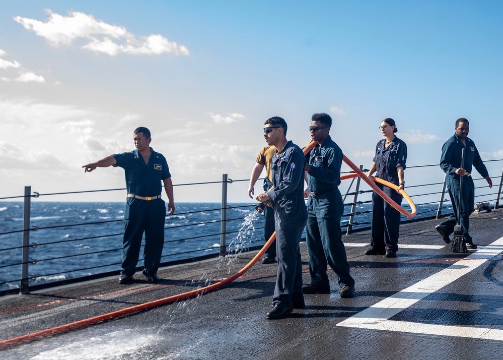 Sailors Conduct a Fresh-Water Wash Down Aboard USS John Finn (DDG 113)