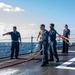 Sailors Conduct a Fresh-Water Wash Down Aboard USS John Finn (DDG 113)