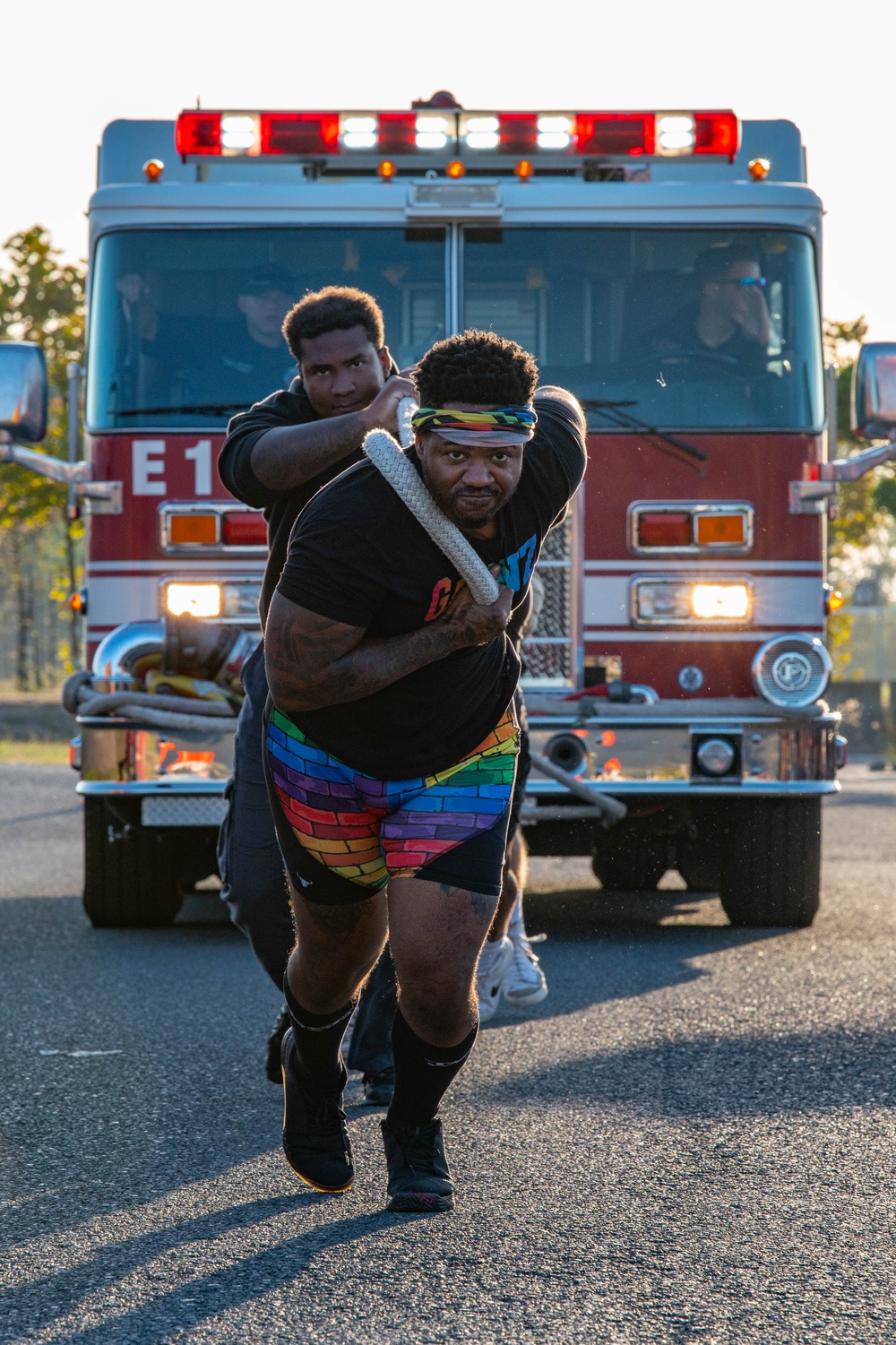 U.S. Navy Sailors, American and Spanish Firefighters participate in Firefighter Competition