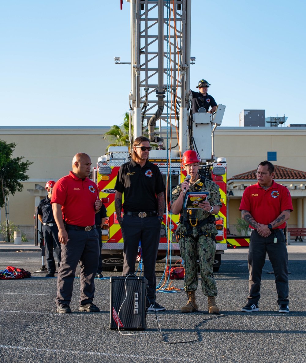 U.S. Navy Sailors, American and Spanish Firefighters participate in Firefighter Competition