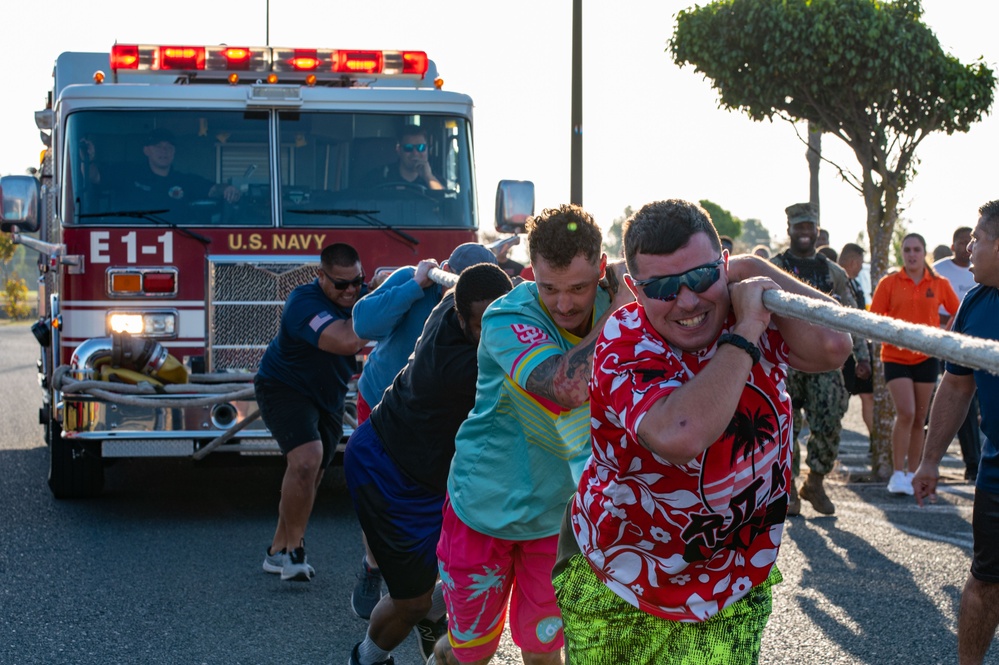 U.S. Navy Sailors, American and Spanish Firefighters participate in Firefighter Competition