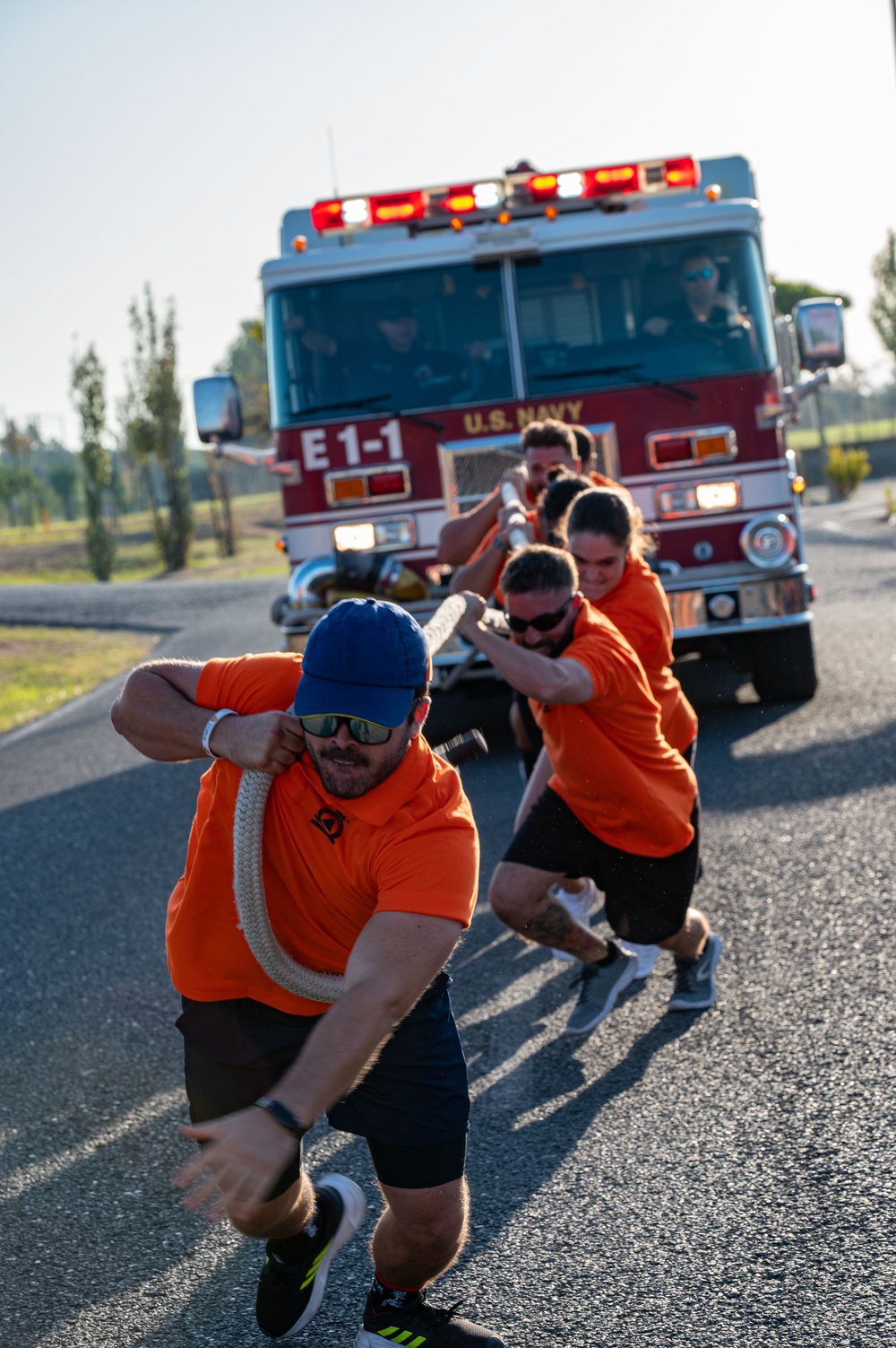 U.S. Navy Sailors, American and Spanish Firefighters participate in Firefighter Competition