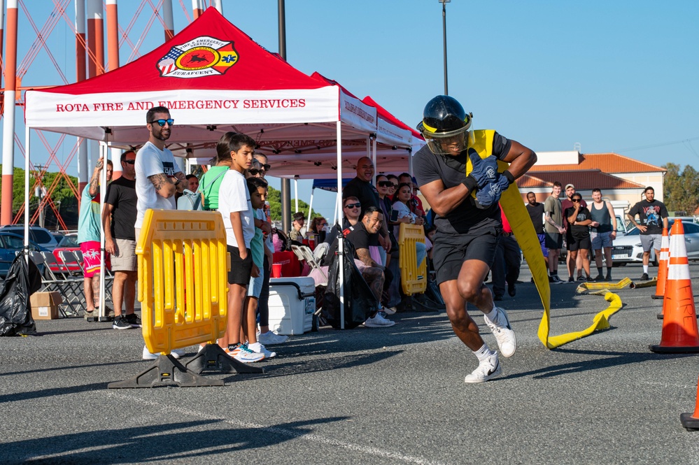 U.S. Navy Sailors, American and Spanish Firefighters participate in Firefighter Competition