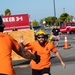 U.S. Navy Sailors, American and Spanish Firefighters participate in Firefighter Competition