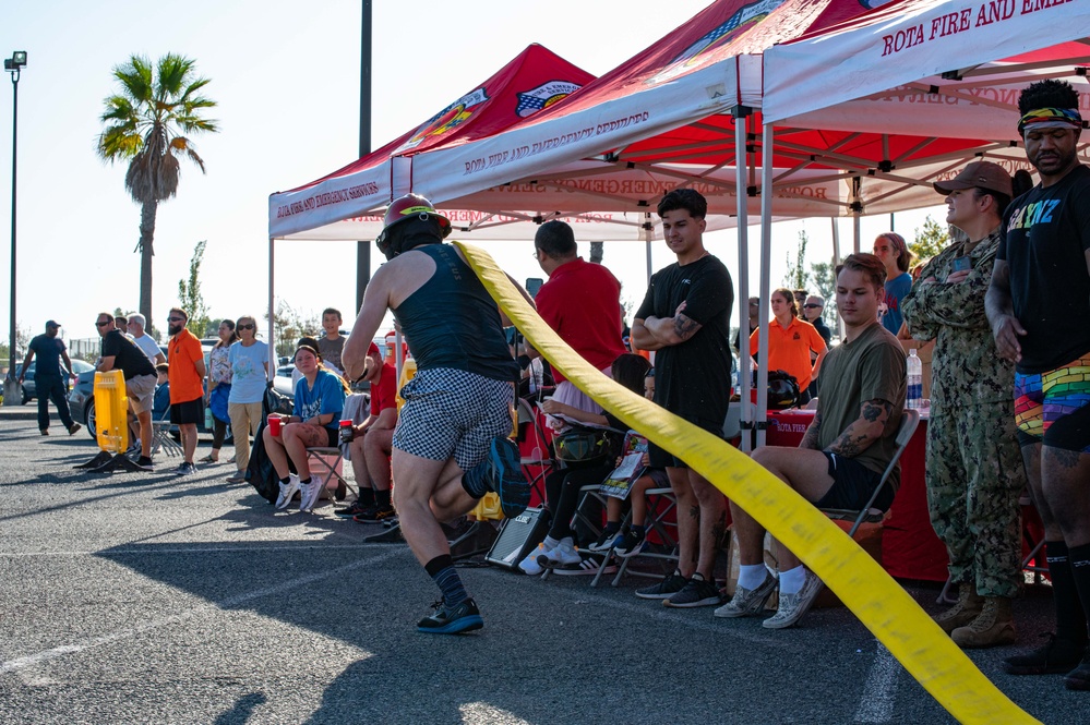 U.S. Navy Sailors, American and Spanish Firefighters participate in Firefighter Competition