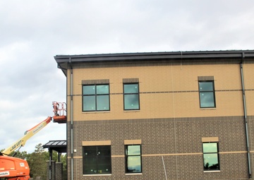 Construction operations of $11.96 million transient training brigade headquarters at Fort McCoy