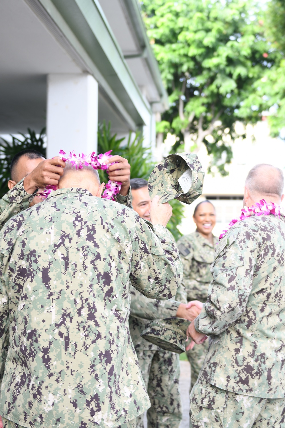 Acting Navy Surgeon General, Rear Adm. Darin K. Via, and Force Master Chief Michael J. Roberts, director of the Hospital Corps NMRTC