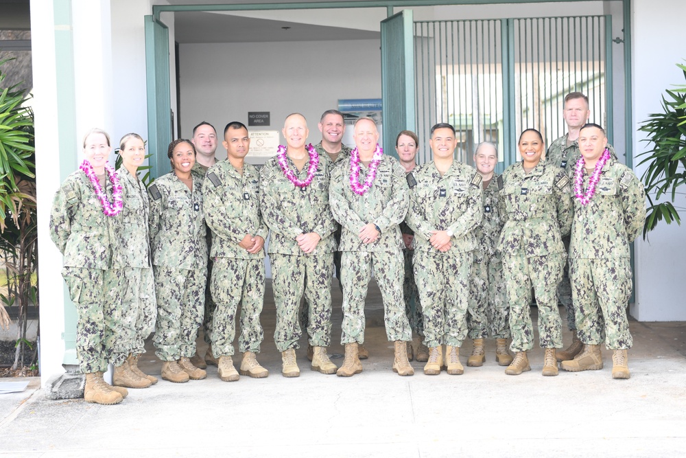 Acting Navy Surgeon General, Rear Adm. Darin K. Via, and Force Master Chief Michael J. Roberts, director of the Hospital Corps NMRTC