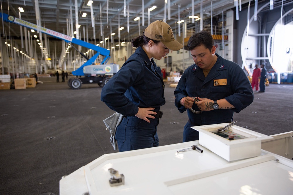 Abraham Lincoln Sailors conduct routine maintenance