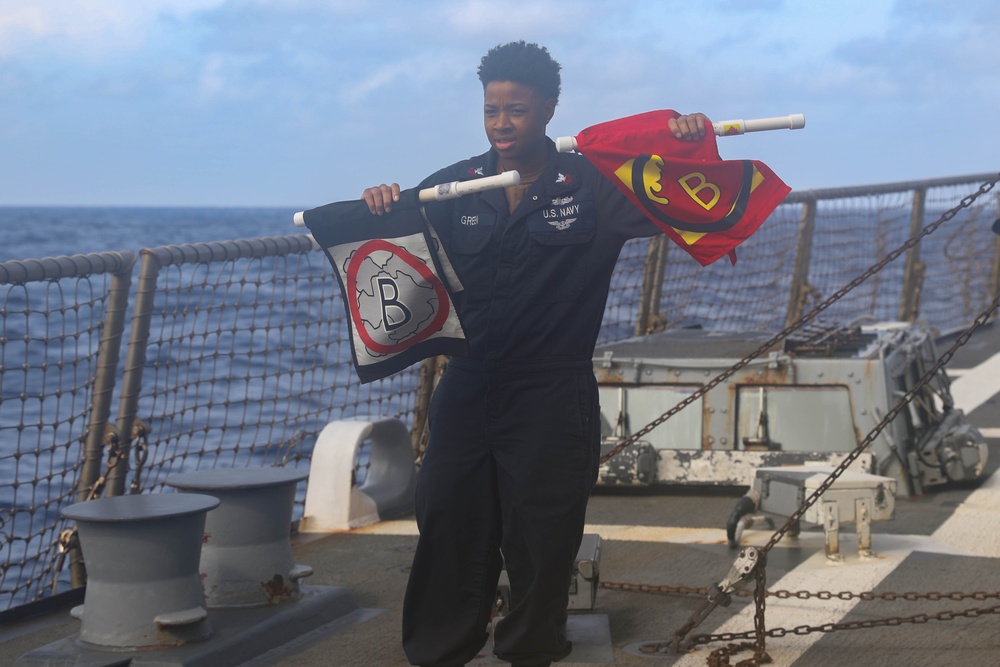 Sailors aboard the USS Rafael Peralta (DDG 115) conduct a crash and salvage drill