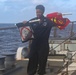 Sailors aboard the USS Rafael Peralta (DDG 115) conduct a crash and salvage drill