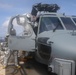 Sailors aboard the USS Rafael Peralta (DDG 115) conduct a crash and salvage drill