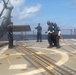 Sailors aboard the USS Rafael Peralta (DDG 115) conduct a crash and salvage drill