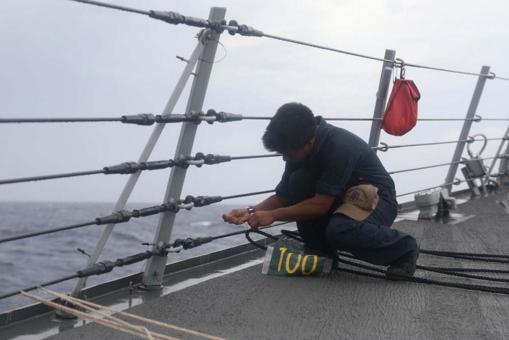 Sailors aboard the USS Rafael Peralta (DDG 115) conduct a replenishment-at-sea with Canadian Naval Replenishment Unit Asterix