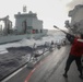 Sailors aboard the USS Rafael Peralta (DDG 115) conduct a replenishment-at-sea with Canadian Naval Replenishment Unit Asterix