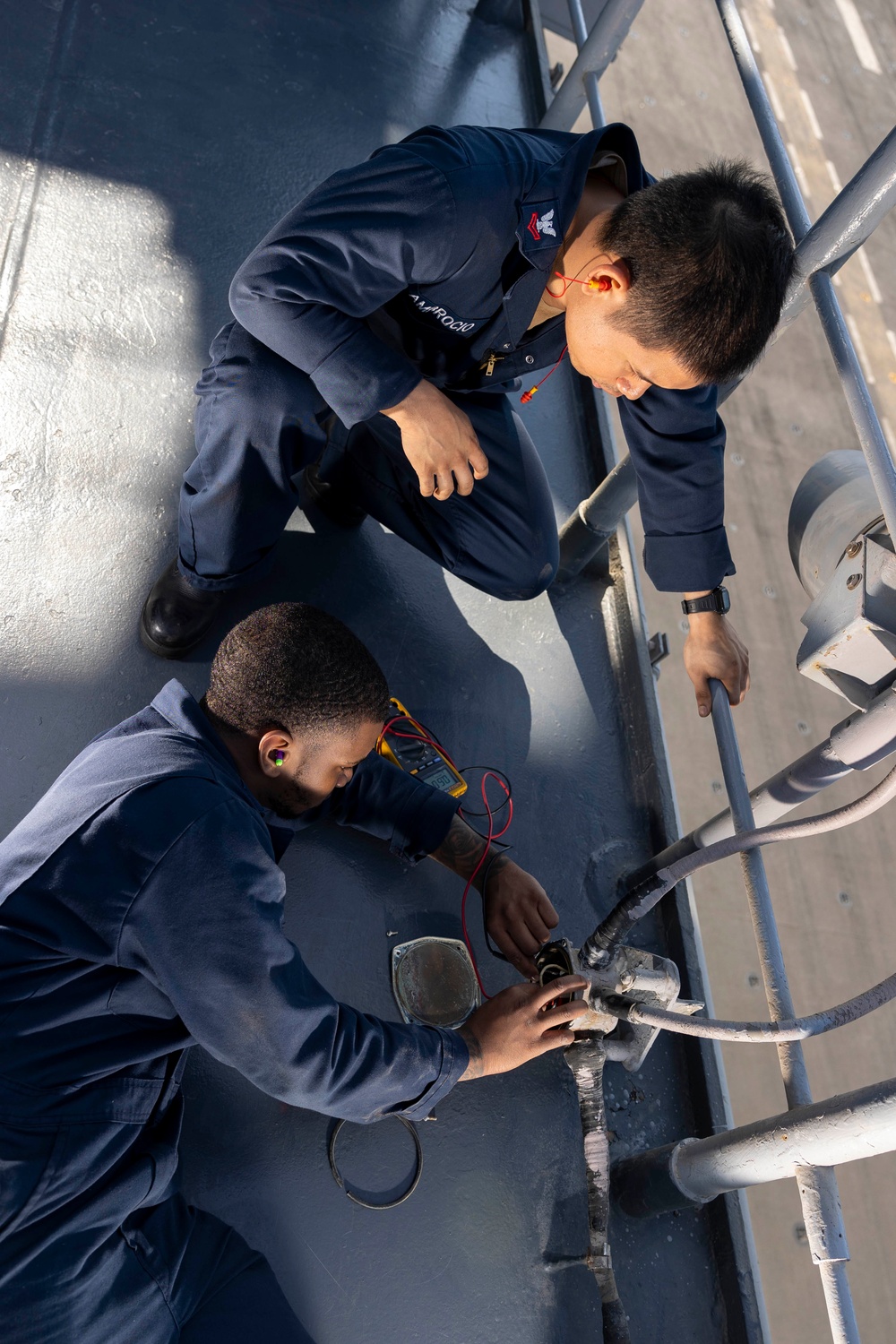 USS Bataan EMs Troubleshoot Flight Deck Lights