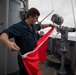 Abraham Lincoln Sailors observe solar eclipse