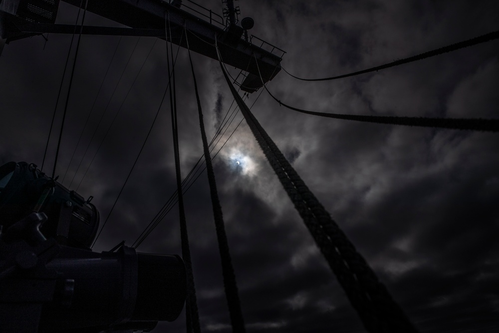 Abraham Lincoln Sailors observe solar eclipse