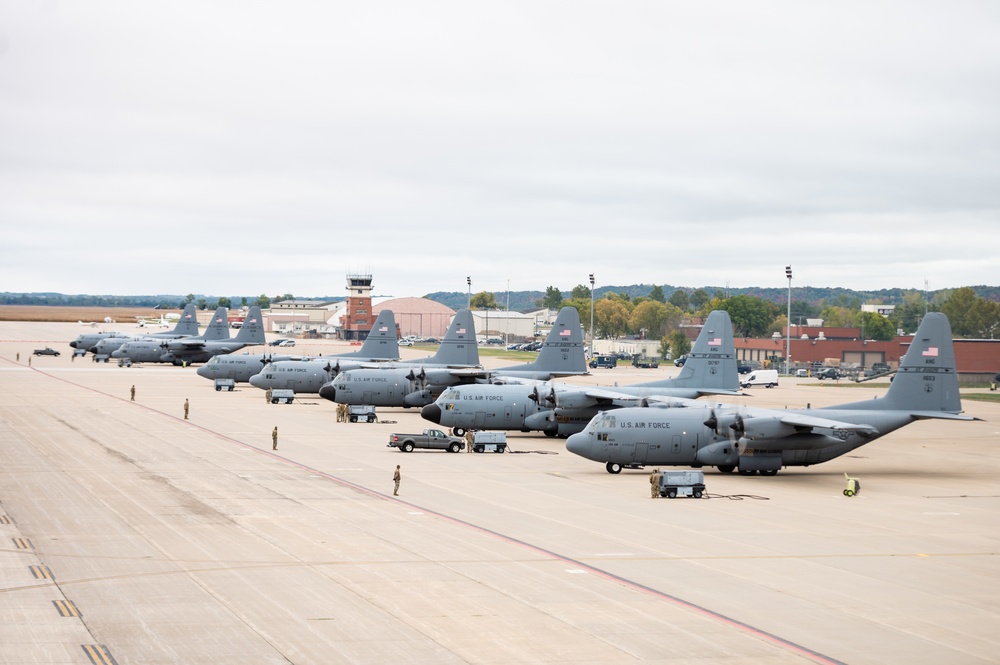 Seven C-130 Hercules aircraft perform ‘elephant walk’