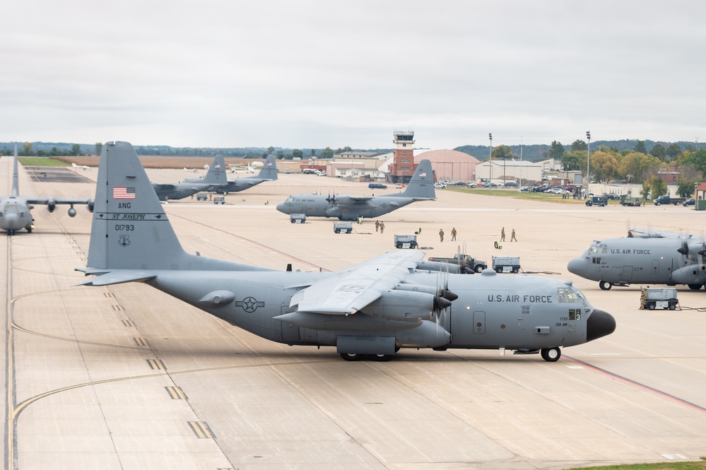Seven C-130 Hercules aircraft perform ‘elephant walk’