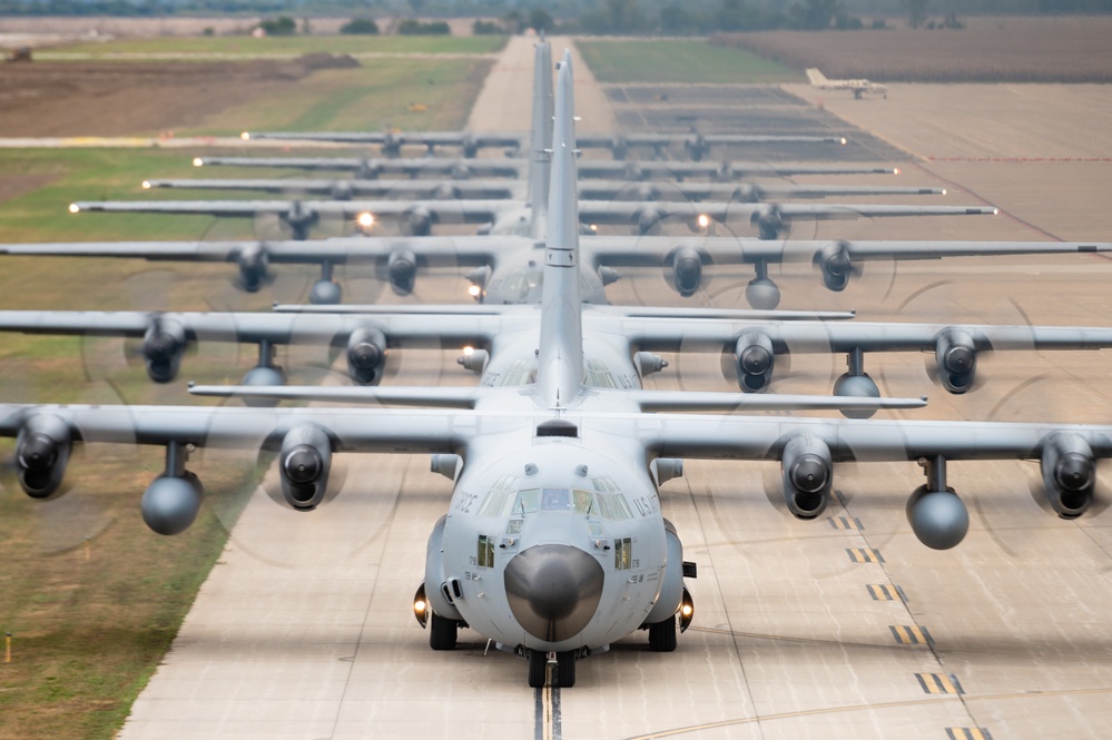 Seven C-130 Hercules aircraft perform ‘elephant walk’