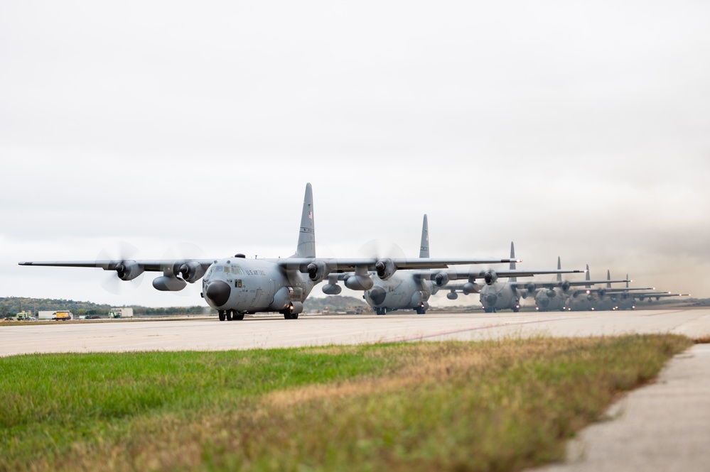 Seven C-130 Hercules aircraft perform ‘elephant walk’