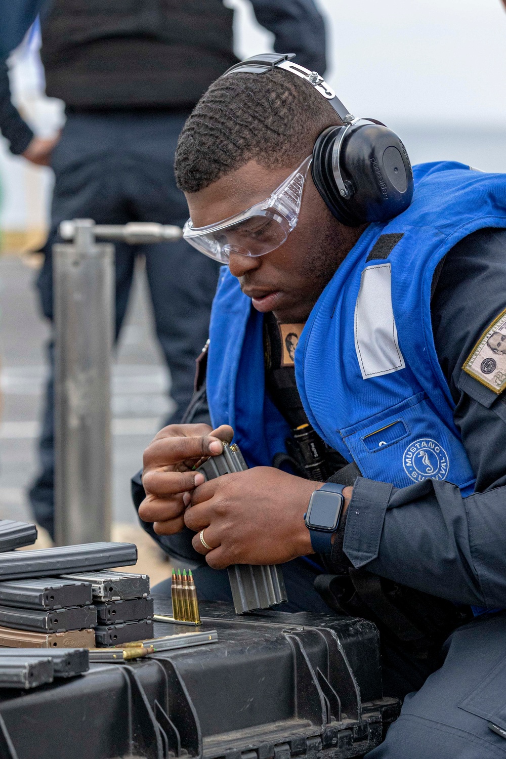 Abraham Lincoln Sailors participate in a live-fire exercise