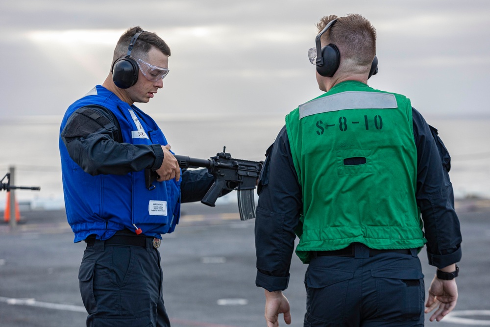 Abraham Lincoln Sailors participate in a live-fire exercise