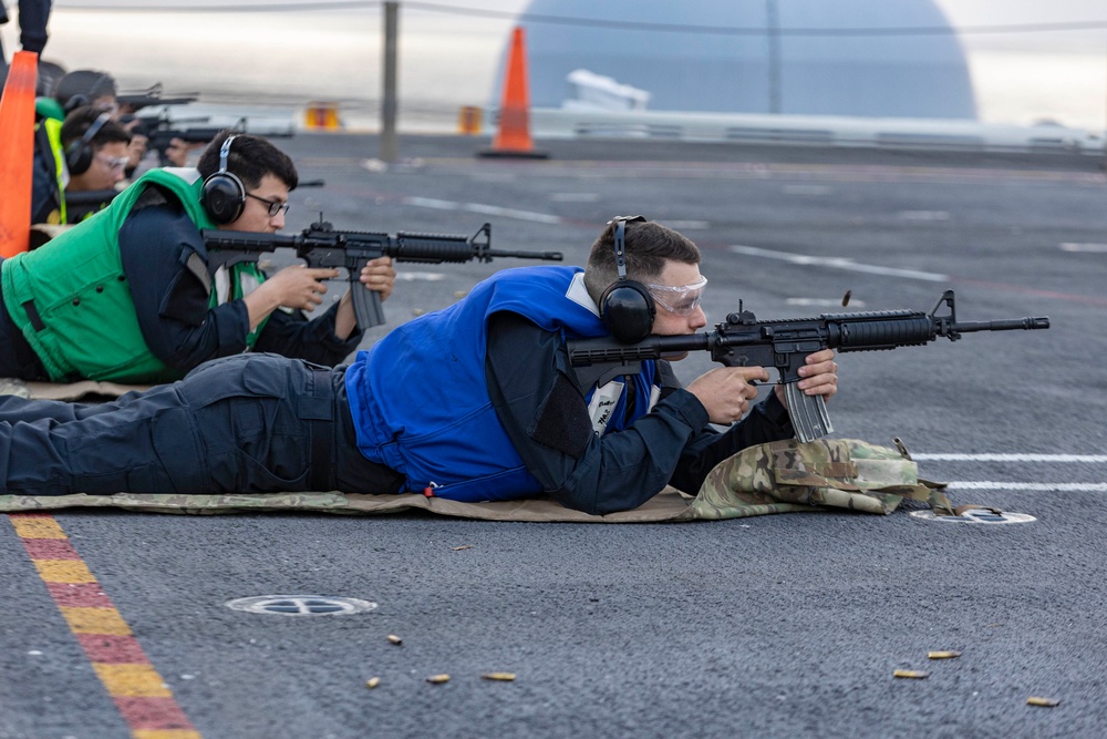 Abraham Lincoln Sailors participate in a live-fire exercise