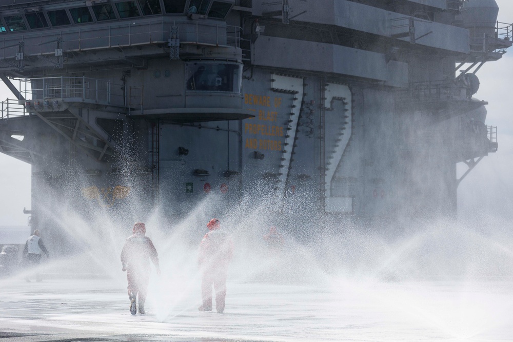 Abraham Lincoln conducts flight deck AFFF sprinkler tests