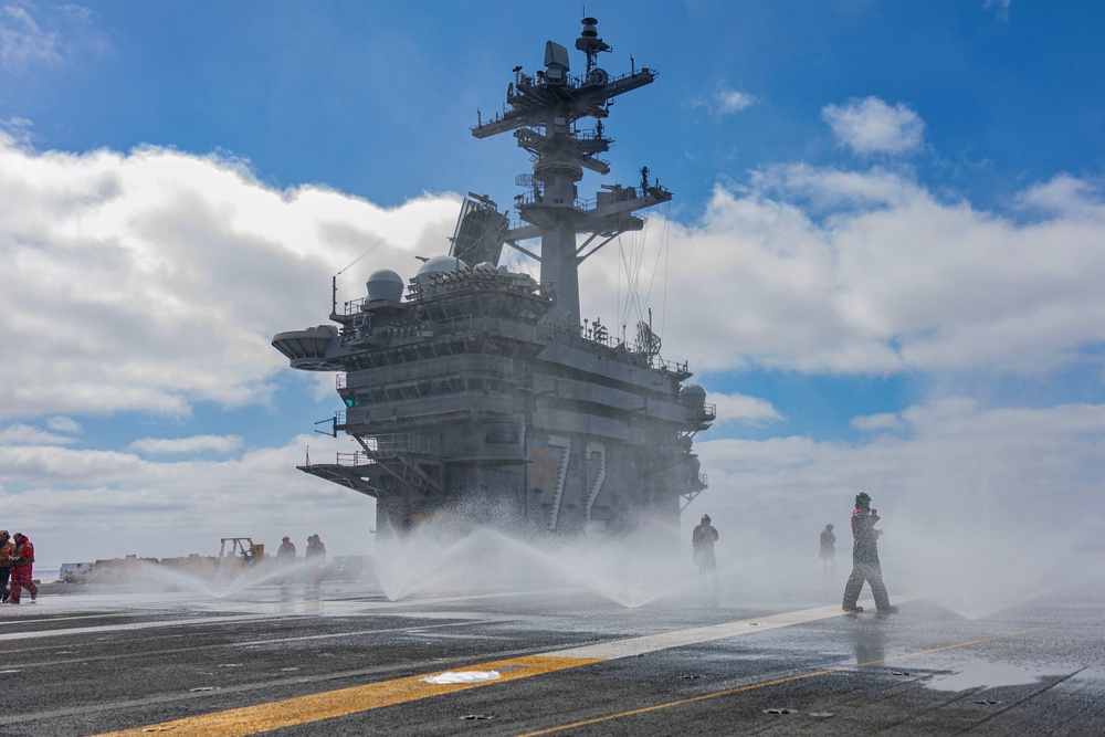 Abraham Lincoln conducts flight deck AFFF sprinkler tests